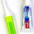 Travel Toothbrush And Small Tube Of Toothpaste